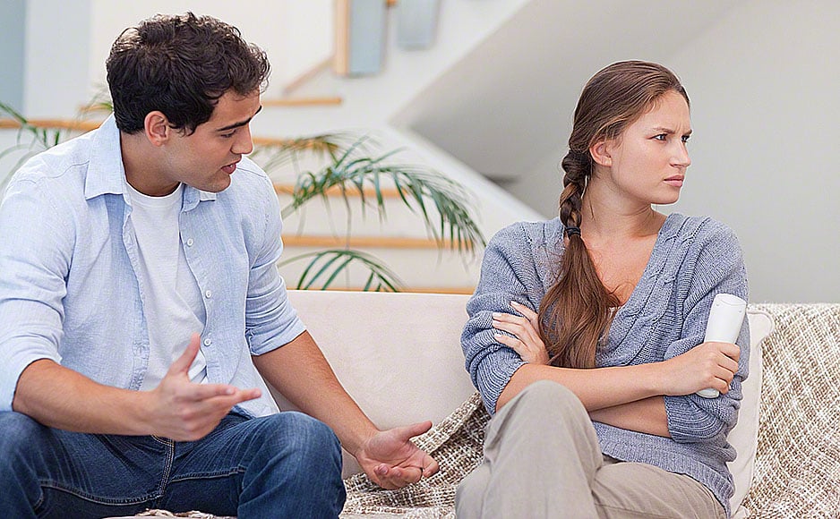 11632821 – man arguing with his wife in their living room