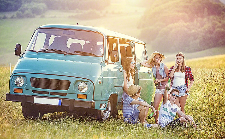 Young hipster friends on road trip